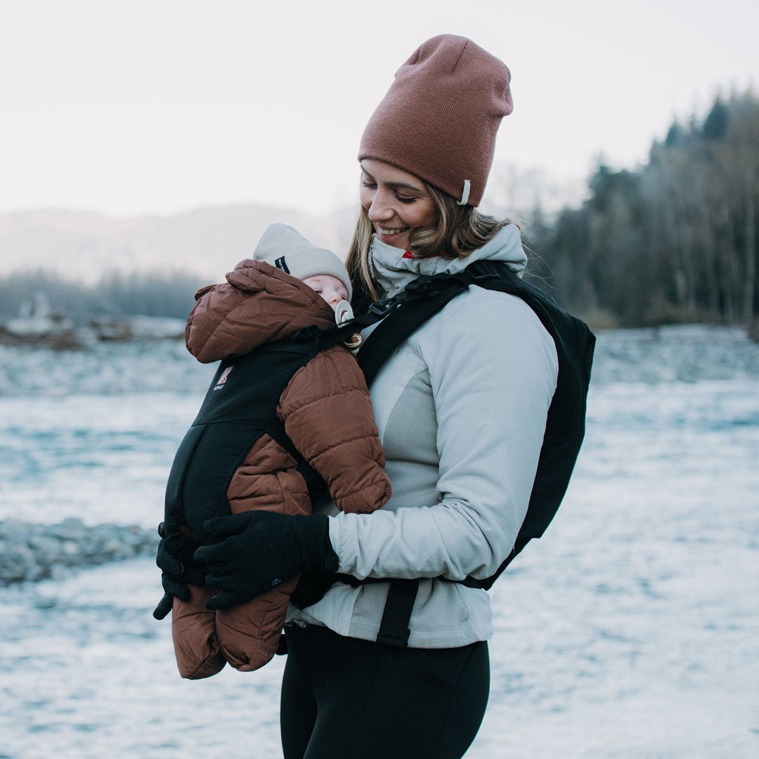 Baby in a carrier best sale